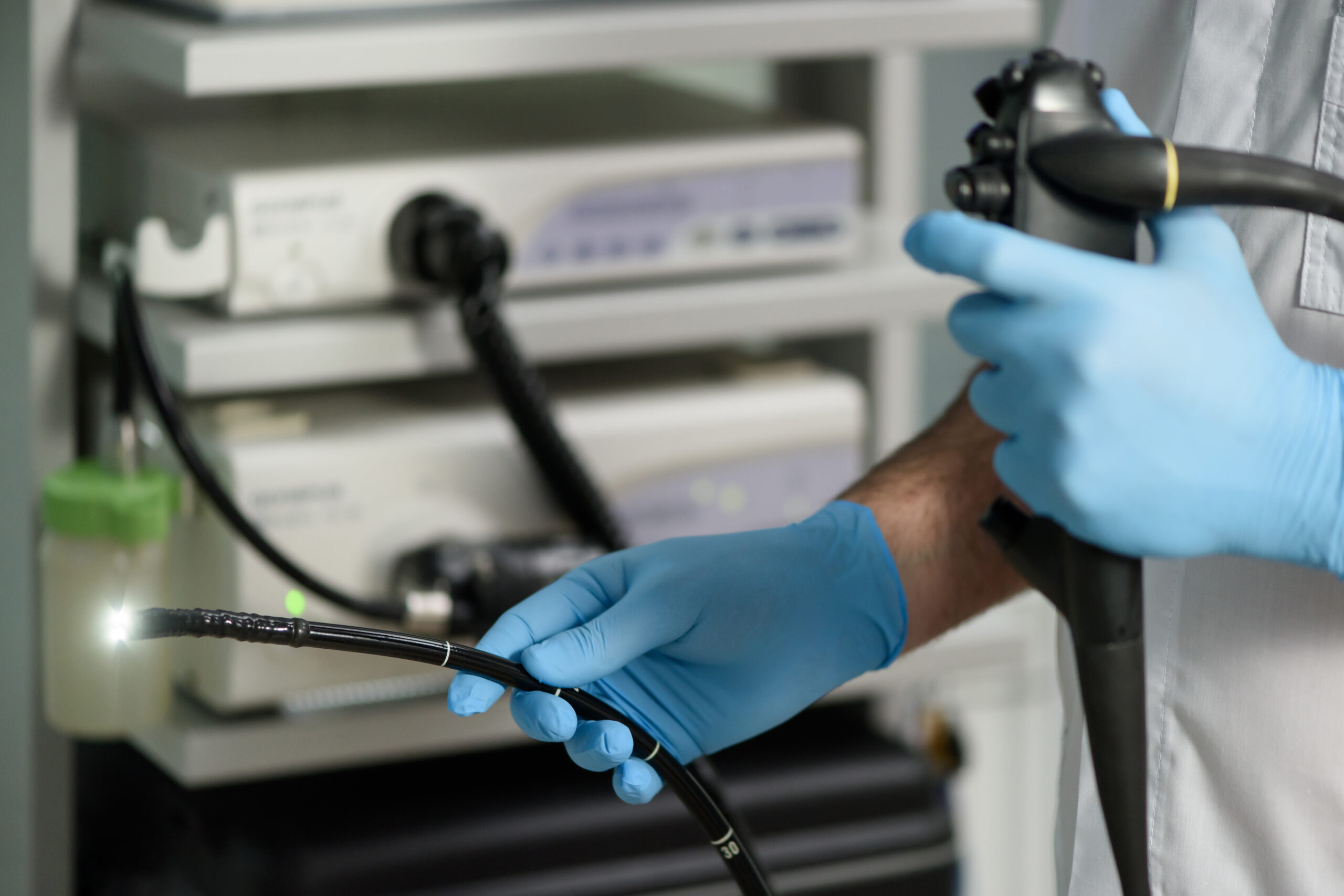 Endoscopic examination in the clinic. Doctor holding an endoscope before a colonoscopy. Medical checkup. drvarbobitis front page